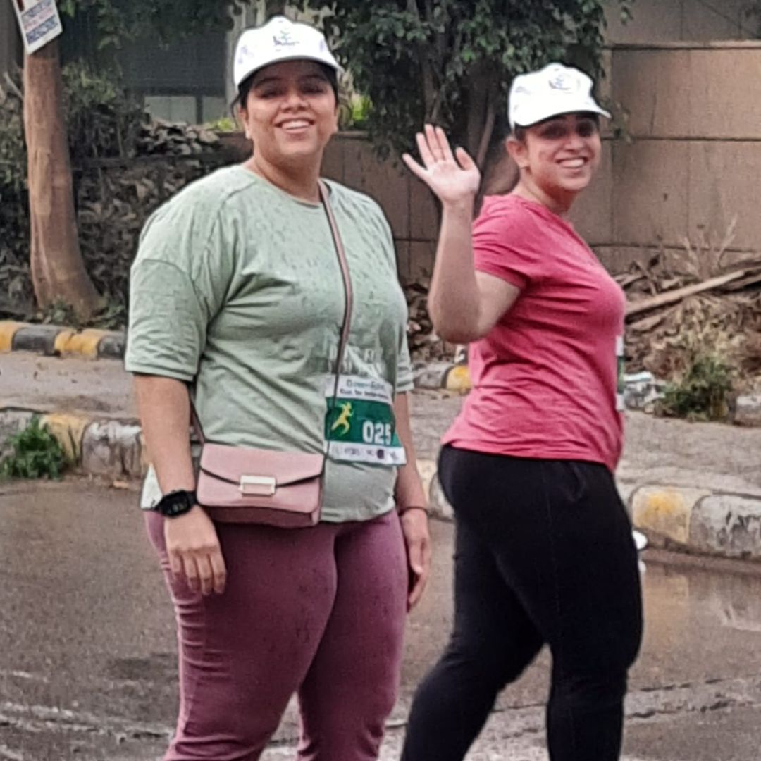 Runner crossing the finish line celebrating