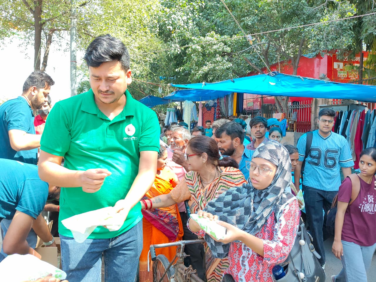 Volunteers organizing food serving stations