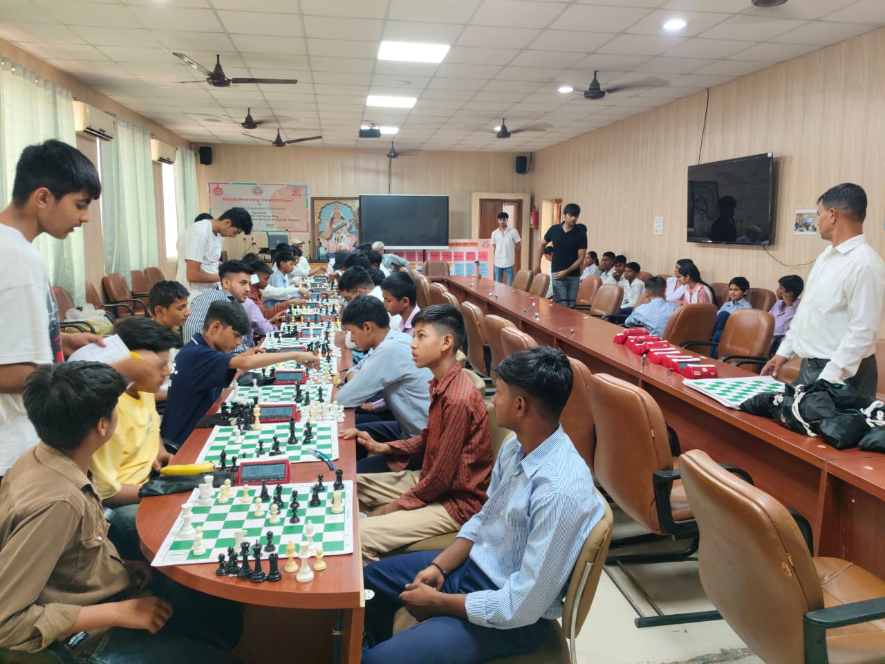 Chess championship winners receiving trophies