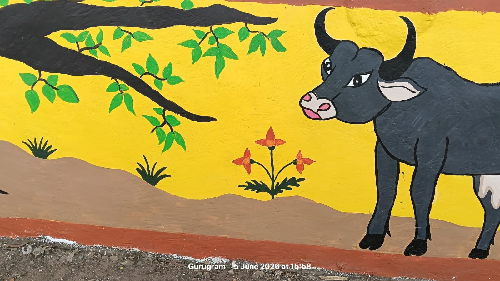Indian folk cattle and blooming wildflower mural artwork